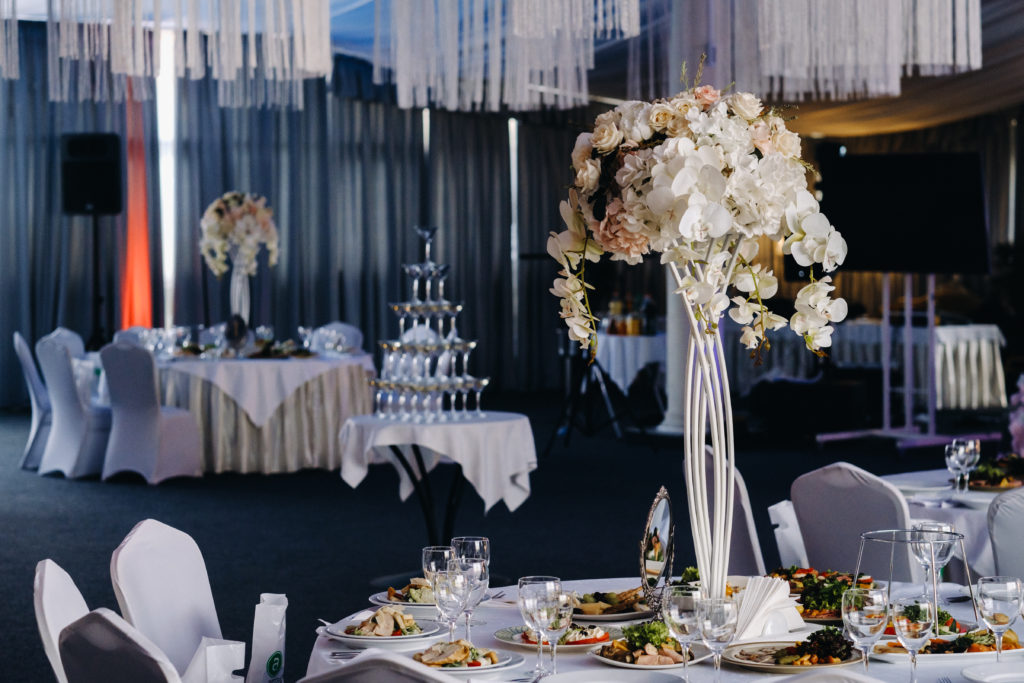 Decorated Table for a wedding reception in a restaurant .Wedding decor