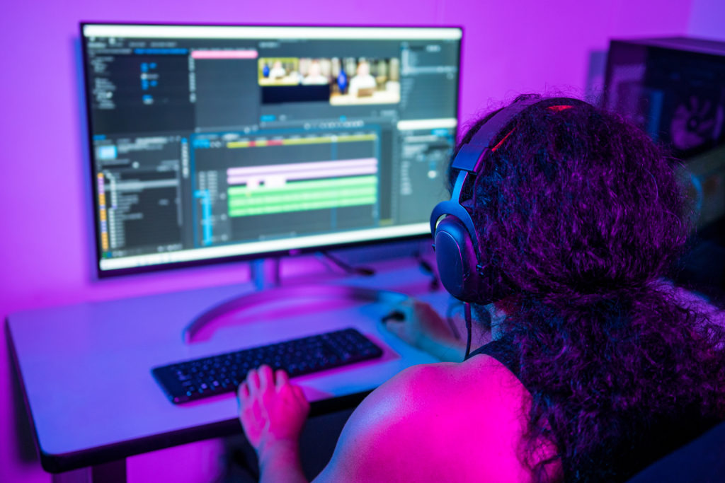 Video editor editing a commercial.