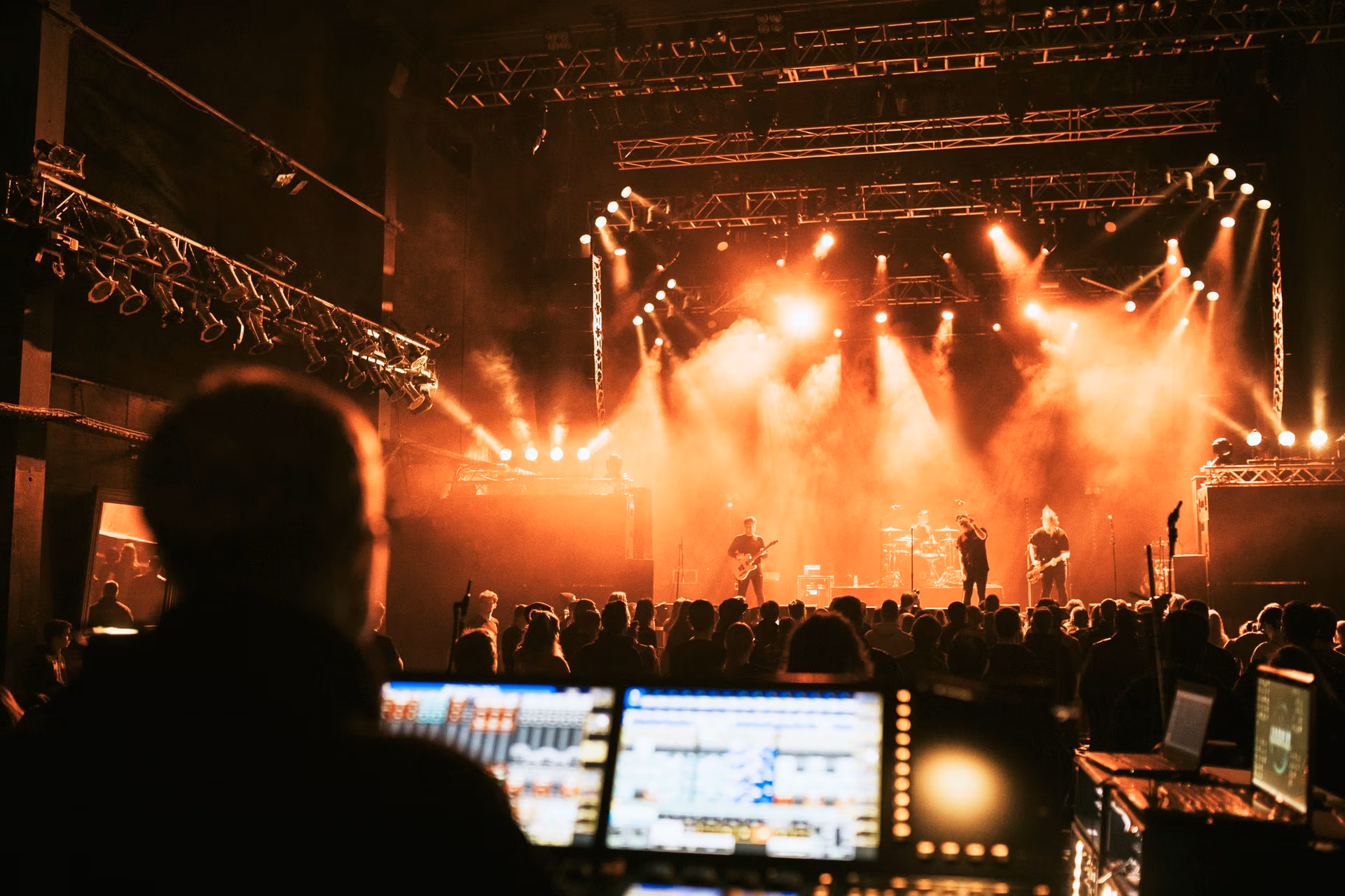 Live Sound Engineer mixing audio at a live event